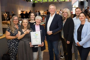 Strahlende Gesichter der Gewinner Gruppenbild